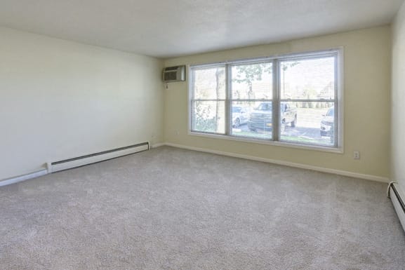 London Towne Apartments – Living Room – Sweet Home Schools - Air Conditioner - Appliances Included - 24 Hour Emergency Maintenance – Ask for a Tour - Pet Friendly
