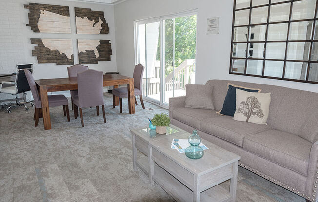 a clubhouse area with a couch and a table