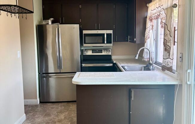 Light and Bright Townhouse in Sought-After Dana Gardens