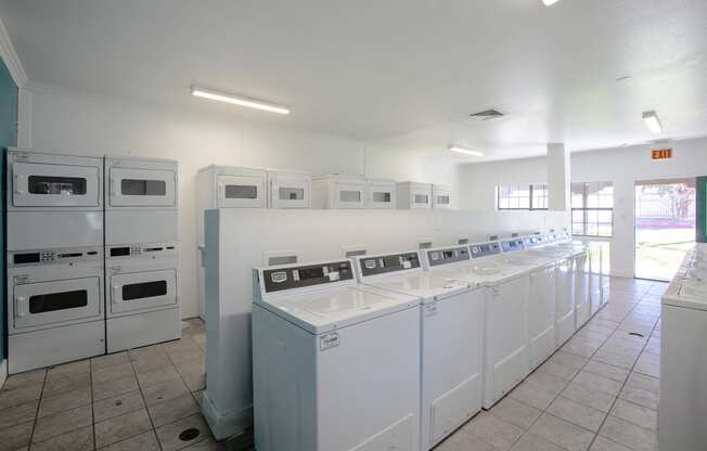 Laundry Center at Whispering Sands Apartments in Albuquerque