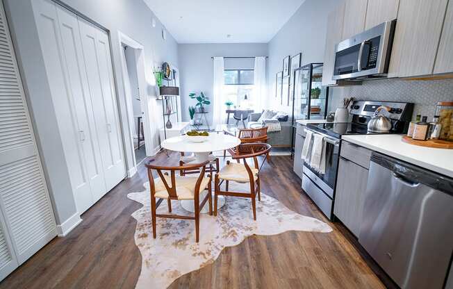 This is an alternate view of the breakfast area in the kitchen of a model apartment at Grand Flats, St. Louis, Missouri