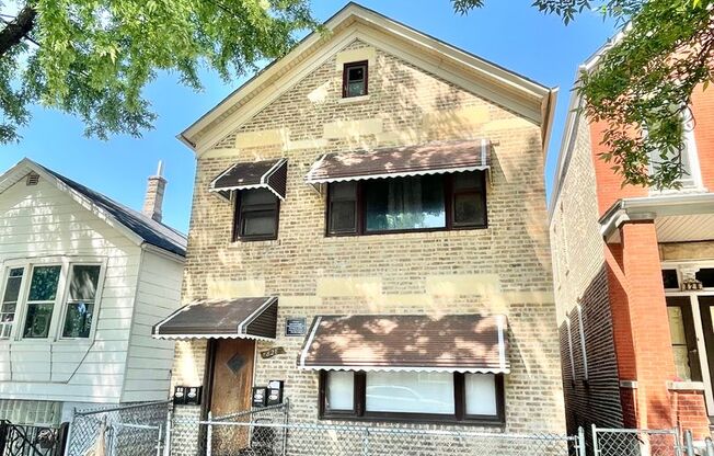 828 W. 34th St.