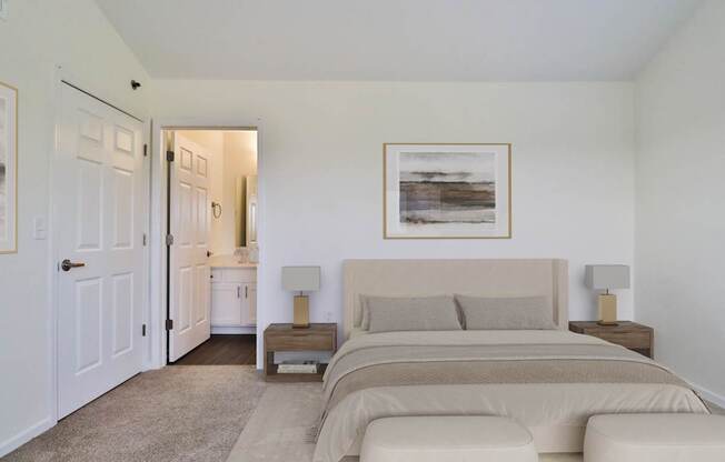 A bedroom with a large bed and a painting on the wall.