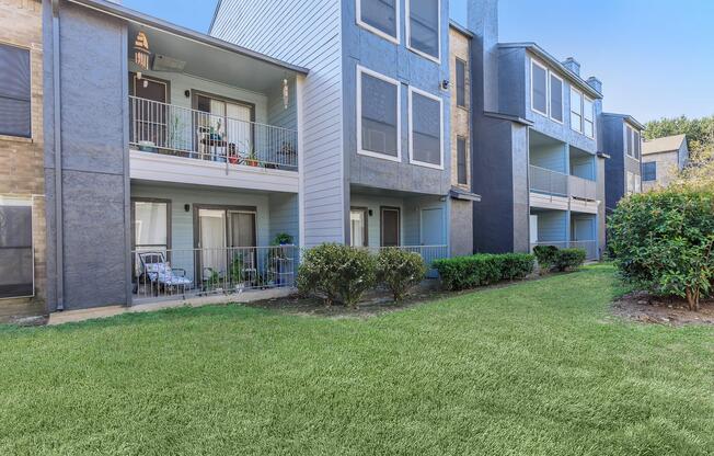 a large lawn in front of a building