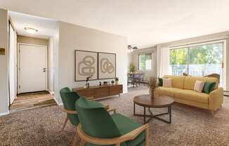 a living room with a yellow couch and green chairs