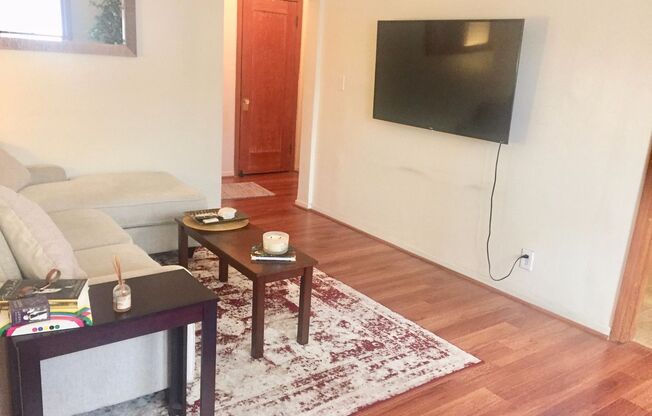 Huge One Bedroom with great light!  Newly remodeled with wood floors, large kitchen, full-size appliances, private vanity room, and new bathroom. Great living in the Miracle Mile.