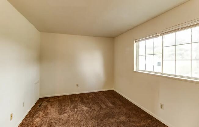 Unfurnished Bedroom at Arbor Pointe Townhomes, Battle Creek, Michigan