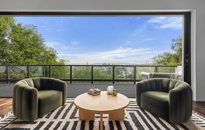 Architectural Contemporary with Panoramic Views & Resort-Caliber Outdoor Living in Franklin Hills