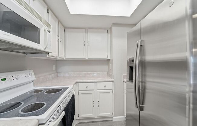 Central Phoenix Gem! Private Patio, Gated, Pool + Underground Parking