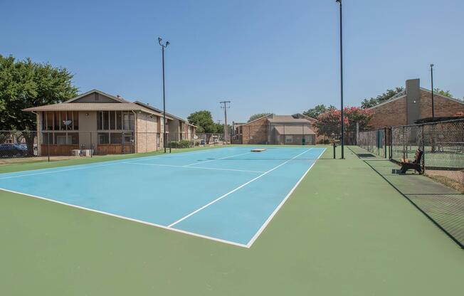 a person on a court with a racket