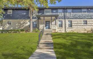 the front of a house with a sidewalk in front of it  at Sunset Ridge, Texas, 78209