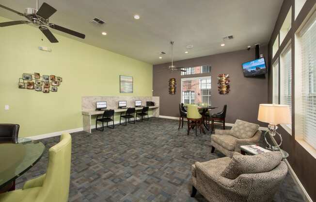 a living room with couches and a table with chairs and a tv at Veranda at Centerfield, Texas, 77070