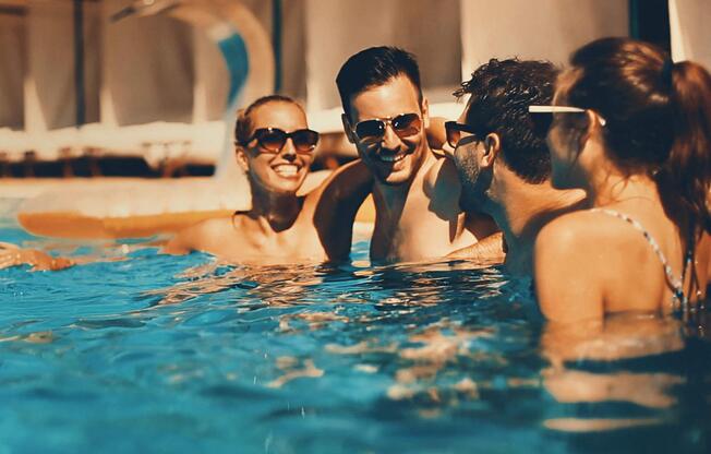 a group of people swimming in the water