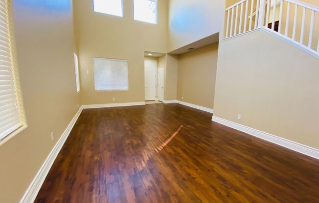 Beautiful & large Rhodes Ranch guard gated community 4 bedroom home with the master bedroom downstairs and a big loft upstairs! With a covered backyard patio. Community features pool, spa, gym, and parks!