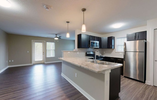 End style kitchen with stainless steel appliances