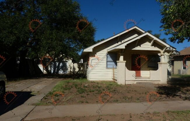 Spacious 2 bedroom 1 bath with large garage.