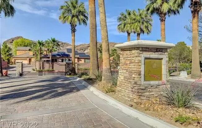 Exquisite fully furnished 2 Bed/2 Bath, Den/Office Single Story home in prestigious Lake Las Vegas. Strip and Golf Course Views