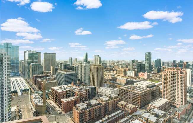 a view of the city from the top of a skyscraper