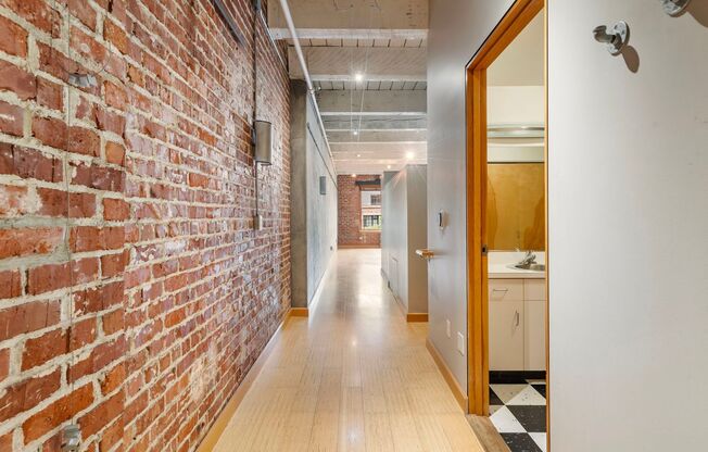 Historic Chown Pella Lofts - east facing studio w/parking/most utilities/rooftop deck