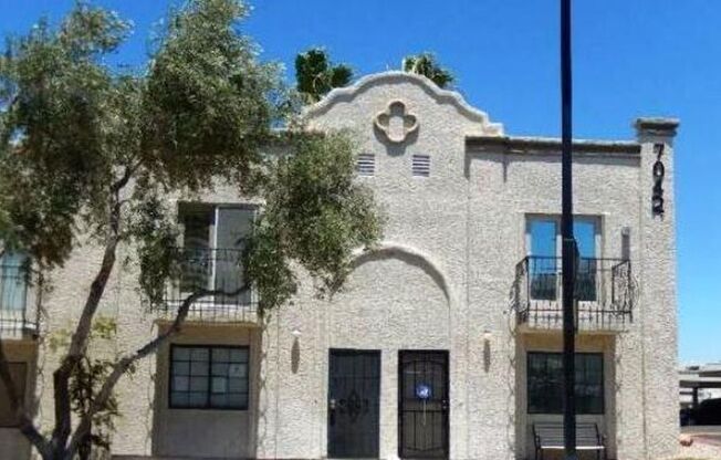 2 story townhome with cute balconies.