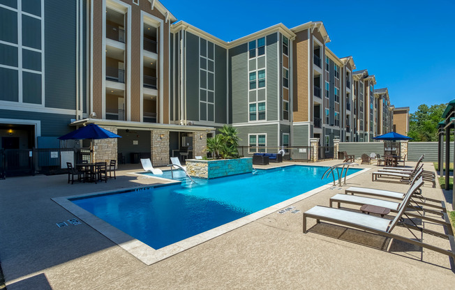Resort Style Swimming Pool with BBQ grills