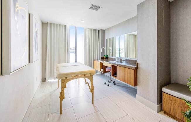 A room with a table and a bench. at Palma, Doral, Florida