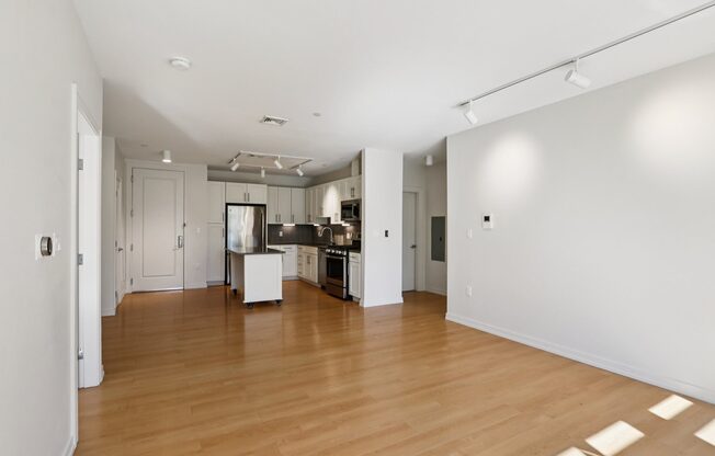 Unfurnished living room with wooden floor at Park77 Apartments, Cambridge, MA, 02138