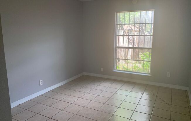 Cute 2/1 townhome with extra storage and covered parking