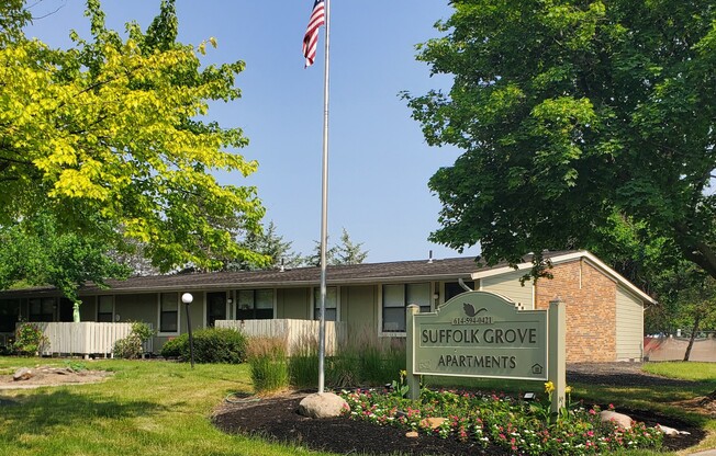 a building with an american flag in front of it