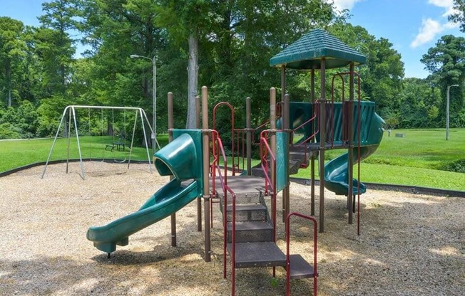 Outdoor playground at Forest Hills apartments