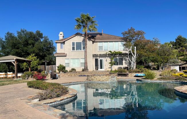 Spectacular 2 story home  w/pool/spa/bulit in BBQ, fire pit and Bocci ball court