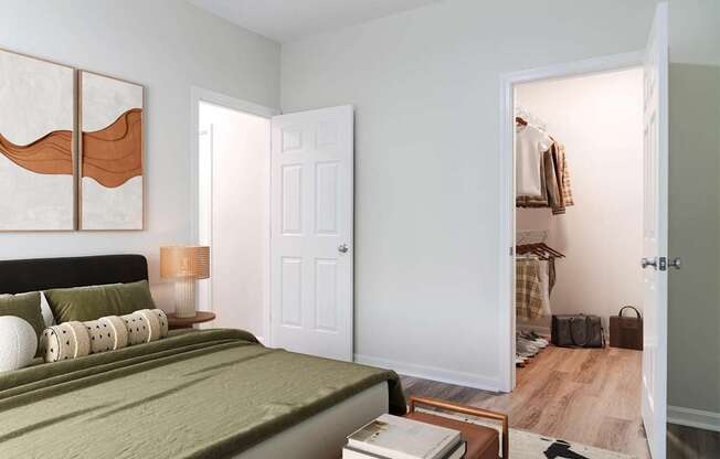 A bedroom with a bed, nightstand, and a painting on the wall.