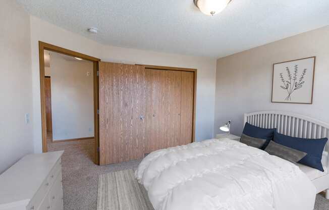 Comfortable Bedroom at Sunset Ridge Apartments in Bismarck, ND