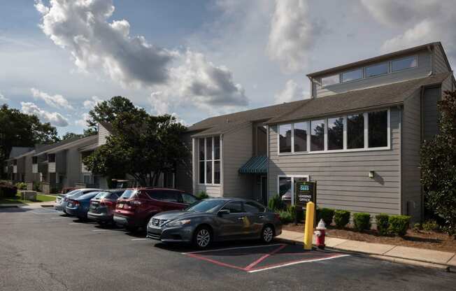 a building with a parking lot in front of it