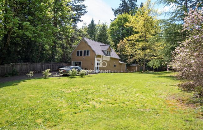 Nearly 1/2 Acre of Privacy Nestled in the Trees of West Linn. Updated Kitchen & Bathroom!