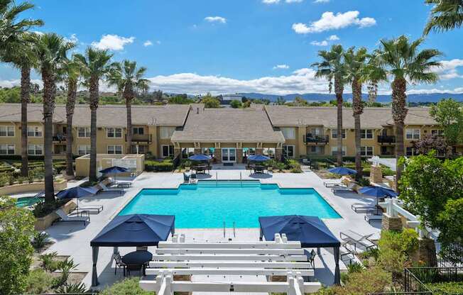 Pool and building view of 55+ FountainGlen Temecula