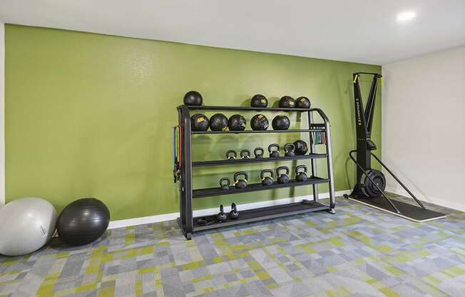 Community Fitness Center with Equipment at Tanque Verde Apartments located in Tucson, AZ.