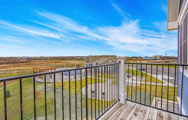 Sunny Balcony View at Meadowbrooke Apartment Homes in Kentwood, MI 49512