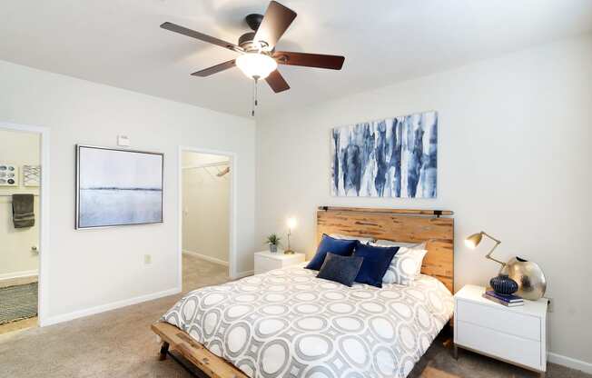 a bedroom with a bed and a ceiling fan at Landing Willow Bayou in Bossier City, LA