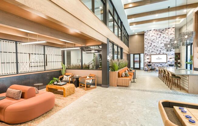 Expansive and artfully designed, the clubhouse at Modera Higley Commons offers inviting spaces to gather, unwind, and connect.