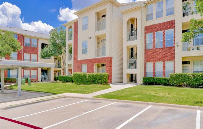 Carports and balconies of Montfort Place in North Dallas, TX, For Rent. Now leasing 1 and 2 bedroom apartments.