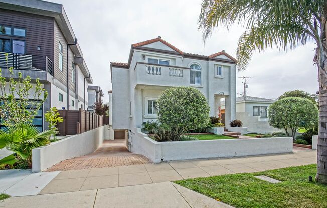 Beautifully Remodeled, Detached Front Townhome w/ Amazing Dual Open Living Spaces, Incredible Outdoor Space & 2-Car Garage Just Blocks to Schools, Shopping & 2 Mins to Beach!