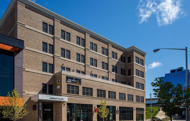 A building with the name "FARLEY FLATS" on the front.