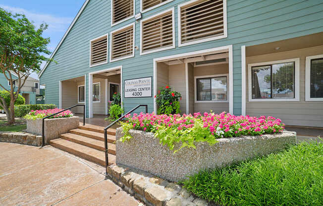 A building with a sign that reads "Chasman Dental" is shown.