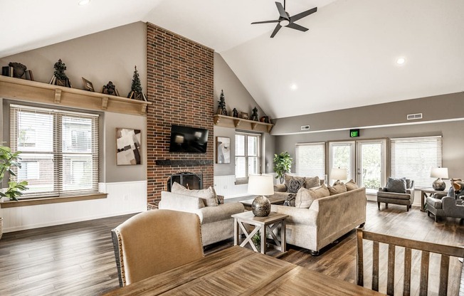 A living room with a fireplace and a couch