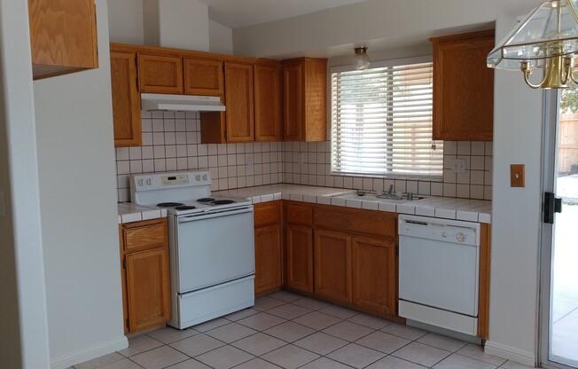 Big backyard on this NW home, Central Unified Schools. Close to shopping and HWY 99.