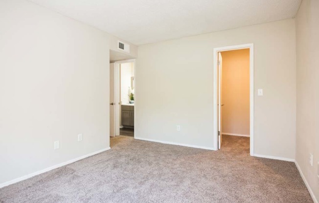 Empty Bedroom with carpet at Eclipse Duluth