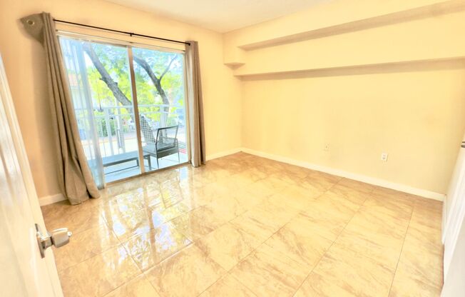 Beachside One Bedroom Condo with Parking and In Unit Laundry