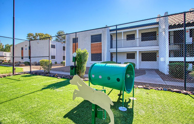 a dog park in front of a building