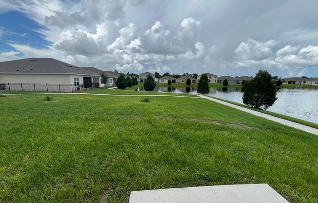 Amazing 5 bedroom 3 bath newly built home near Lake Nona with water views and room for everyone!